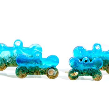 Chapa identificativa con forma de hueso para mascotas con aspecto de playa